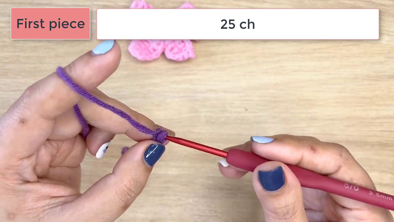 Master the Art of Crochet: A Step-by-Step Guide to Crafting a Beautiful Bow 3 A close-up of the hands actively crocheting the first purple piece, with a text overlay showing the stitch sequence: "2 hdc, 2 dc, 2 tr, 2dc, 2 hdc, 2 slst."