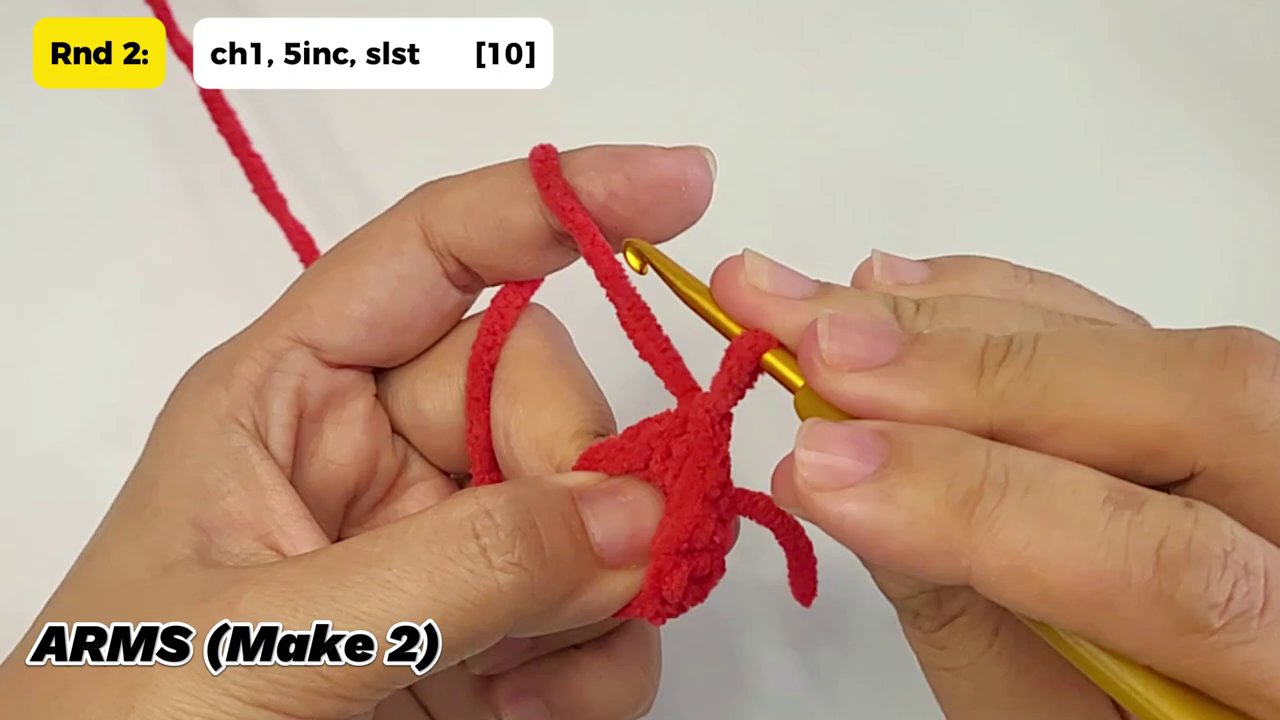 Craft a Festive Snowman Couple: A Cozy Crochet Tutorial for the Holidays 4 A focused view of hands crocheting with white yarn, executing the precise stitches for Rnd 15 to shape the body.