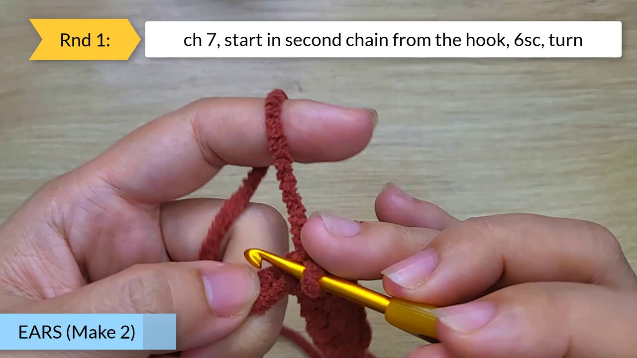 Craft Your Own Adorable Crochet Dog Bun: A Beginner's Step-by-Step Guide 6 A focused shot on the hands working a detailed round, with red annotations in the instruction box highlighting specific stitches.