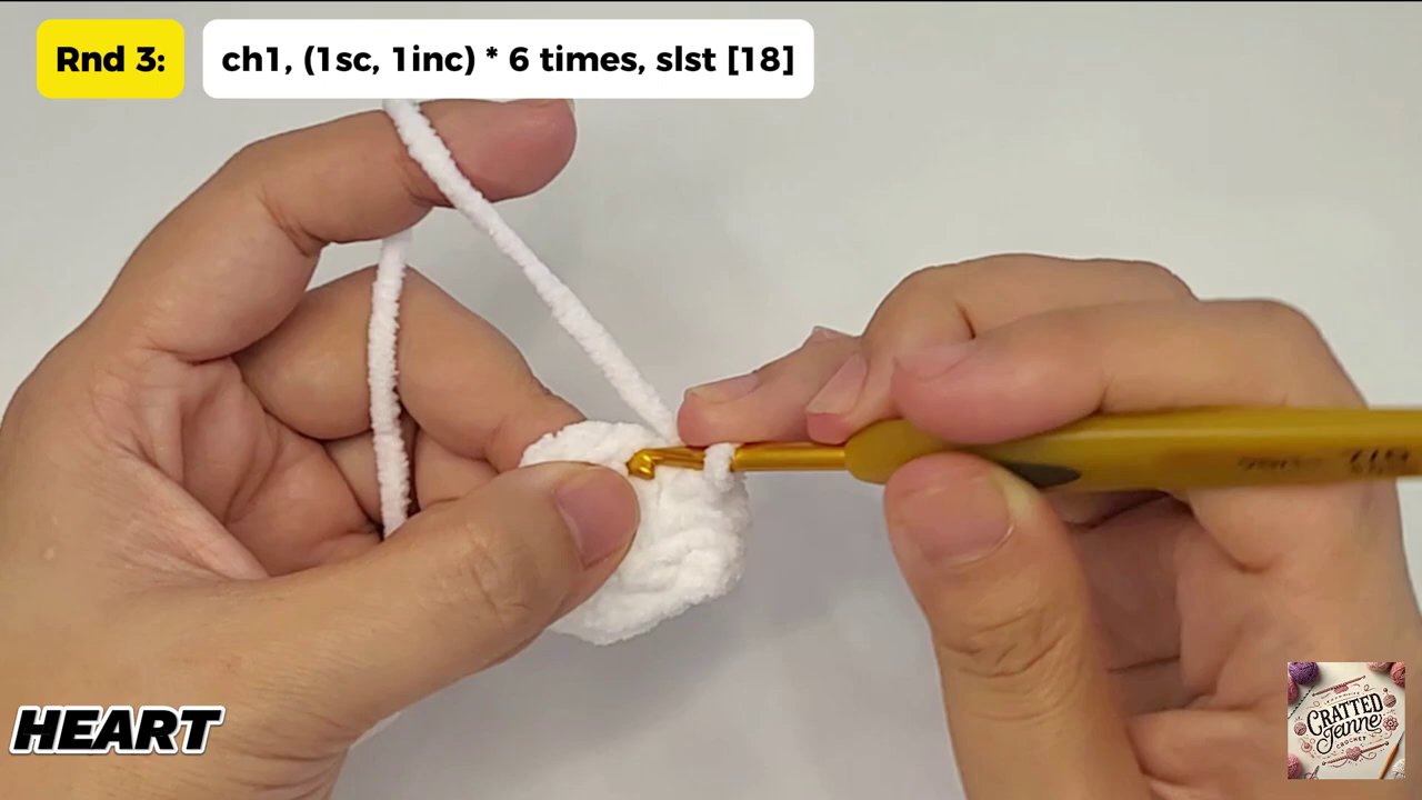 Craft a Heartwarming Christmas Gift: A Step-by-Step Guide to Crocheting a Heart Bear 6 Hands carefully inserting small tufts of white fiberfill into the heart cavity through the open gap.