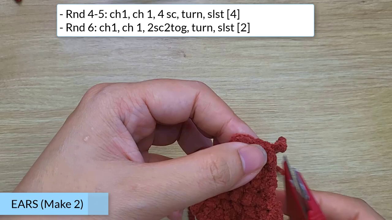 Craft Your Own Adorable Crochet Dog Bun: A Beginner's Step-by-Step Guide 8 A final, detailed shot of the crochet piece in progress, highlighting the texture and form achieved through consistent stitching.