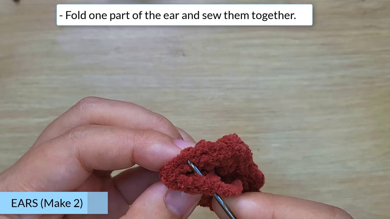 Craft Your Own Adorable Crochet Dog Bun: A Beginner's Step-by-Step Guide 9 A completed view of the crochet dog bun head with ears and safety eyes attached, showcasing the final adorable character.